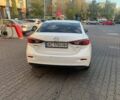 Белый Мазда 3, объемом двигателя 2 л и пробегом 109 тыс. км за 11800 $, фото 2 на Automoto.ua