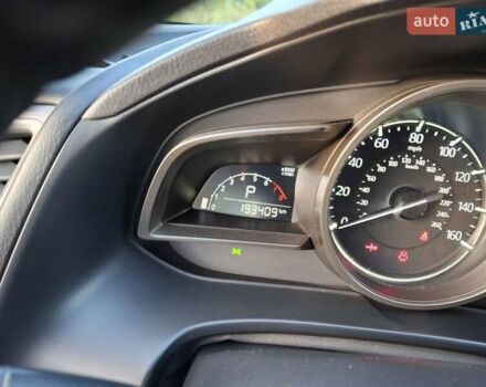 Белый Мазда 3, объемом двигателя 2 л и пробегом 193 тыс. км за 12800 $, фото 13 на Automoto.ua