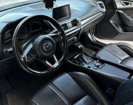 Белый Мазда 3, объемом двигателя 2 л и пробегом 193 тыс. км за 13500 $, фото 16 на Automoto.ua