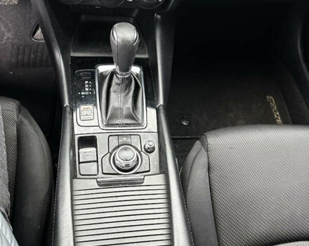 Белый Мазда 3, объемом двигателя 2 л и пробегом 196 тыс. км за 11000 $, фото 18 на Automoto.ua