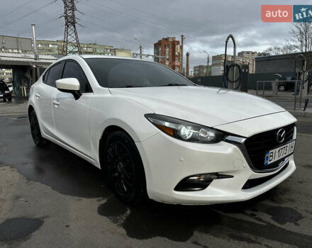 Белый Мазда 3, объемом двигателя 2 л и пробегом 196 тыс. км за 11000 $, фото 4 на Automoto.ua