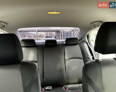 Белый Мазда 3, объемом двигателя 2 л и пробегом 196 тыс. км за 11000 $, фото 25 на Automoto.ua