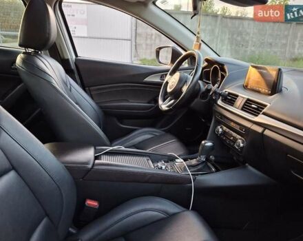 Белый Мазда 3, объемом двигателя 2 л и пробегом 193 тыс. км за 12800 $, фото 8 на Automoto.ua