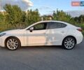 Белый Мазда 3, объемом двигателя 2 л и пробегом 193 тыс. км за 12800 $, фото 3 на Automoto.ua