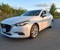 Белый Мазда 3, объемом двигателя 2 л и пробегом 193 тыс. км за 12800 $, фото 1 на Automoto.ua