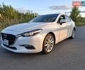 Белый Мазда 3, объемом двигателя 2 л и пробегом 193 тыс. км за 12800 $, фото 1 на Automoto.ua