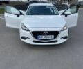 Белый Мазда 3, объемом двигателя 2 л и пробегом 111 тыс. км за 10400 $, фото 2 на Automoto.ua