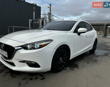 Белый Мазда 3, объемом двигателя 2 л и пробегом 196 тыс. км за 11000 $, фото 5 на Automoto.ua