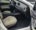 Белый Мазда 3, объемом двигателя 2 л и пробегом 130 тыс. км за 9900 $, фото 10 на Automoto.ua