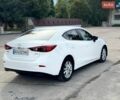 Білий Мазда 3, об'ємом двигуна 1.5 л та пробігом 103 тис. км за 9000 $, фото 4 на Automoto.ua