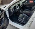 Білий Мазда 3, об'ємом двигуна 2 л та пробігом 63 тис. км за 13700 $, фото 16 на Automoto.ua