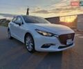 Белый Мазда 3, объемом двигателя 2 л и пробегом 193 тыс. км за 12800 $, фото 1 на Automoto.ua
