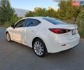 Белый Мазда 3, объемом двигателя 2 л и пробегом 193 тыс. км за 12800 $, фото 4 на Automoto.ua