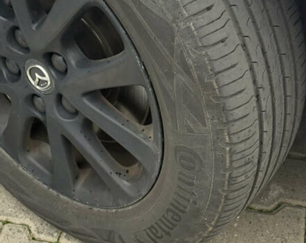 Белый Мазда 3, объемом двигателя 2 л и пробегом 173 тыс. км за 10500 $, фото 8 на Automoto.ua