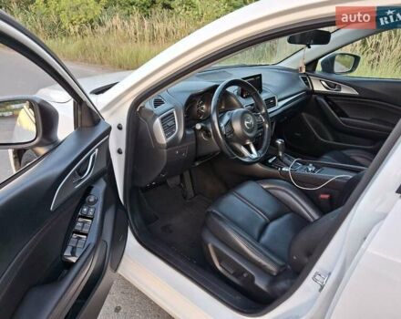 Белый Мазда 3, объемом двигателя 2 л и пробегом 193 тыс. км за 12800 $, фото 14 на Automoto.ua