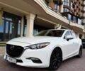 Белый Мазда 3, объемом двигателя 2 л и пробегом 196 тыс. км за 11000 $, фото 1 на Automoto.ua