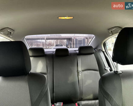 Белый Мазда 3, объемом двигателя 2 л и пробегом 196 тыс. км за 11000 $, фото 27 на Automoto.ua