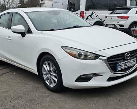 Белый Мазда 3, объемом двигателя 2 л и пробегом 130 тыс. км за 9900 $, фото 1 на Automoto.ua