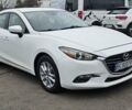 Белый Мазда 3, объемом двигателя 2 л и пробегом 130 тыс. км за 9900 $, фото 1 на Automoto.ua