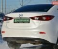 Білий Мазда 3, об'ємом двигуна 2 л та пробігом 90 тис. км за 12700 $, фото 9 на Automoto.ua