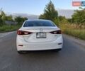 Белый Мазда 3, объемом двигателя 2 л и пробегом 193 тыс. км за 12800 $, фото 5 на Automoto.ua