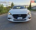Белый Мазда 3, объемом двигателя 2 л и пробегом 193 тыс. км за 12800 $, фото 2 на Automoto.ua