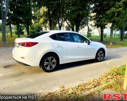 Белый Мазда 3, объемом двигателя 2 л и пробегом 139 тыс. км за 11950 $, фото 2 на Automoto.ua