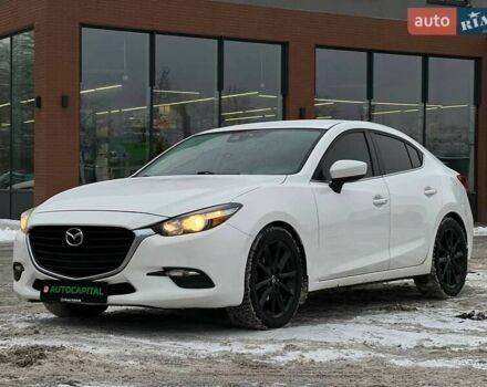 Белый Мазда 3, объемом двигателя 2 л и пробегом 196 тыс. км за 10990 $, фото 4 на Automoto.ua