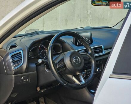 Білий Мазда 3, об'ємом двигуна 1.5 л та пробігом 86 тис. км за 14700 $, фото 19 на Automoto.ua