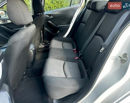 Белый Мазда 3, объемом двигателя 2 л и пробегом 95 тыс. км за 11800 $, фото 28 на Automoto.ua