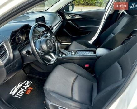 Белый Мазда 3, объемом двигателя 2 л и пробегом 95 тыс. км за 11800 $, фото 31 на Automoto.ua