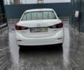Белый Мазда 3, объемом двигателя 2 л и пробегом 174 тыс. км за 12098 $, фото 1 на Automoto.ua