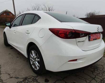 Белый Мазда 3, объемом двигателя 2 л и пробегом 202 тыс. км за 11800 $, фото 2 на Automoto.ua