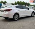 Білий Мазда 3, об'ємом двигуна 2 л та пробігом 70 тис. км за 12500 $, фото 4 на Automoto.ua