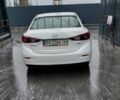 Белый Мазда 3, объемом двигателя 2 л и пробегом 174 тыс. км за 12100 $, фото 1 на Automoto.ua