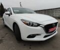 Белый Мазда 3, объемом двигателя 2 л и пробегом 202 тыс. км за 11800 $, фото 1 на Automoto.ua