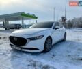 Белый Мазда 3, объемом двигателя 2.49 л и пробегом 128 тыс. км за 16999 $, фото 1 на Automoto.ua