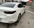 Білий Мазда 3, об'ємом двигуна 2.49 л та пробігом 75 тис. км за 14000 $, фото 3 на Automoto.ua