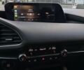 Білий Мазда 3, об'ємом двигуна 2.49 л та пробігом 61 тис. км за 18000 $, фото 26 на Automoto.ua