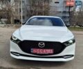 Белый Мазда 3, объемом двигателя 2.49 л и пробегом 76 тыс. км за 18800 $, фото 1 на Automoto.ua