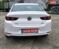 Білий Мазда 3, об'ємом двигуна 2.49 л та пробігом 56 тис. км за 17500 $, фото 4 на Automoto.ua