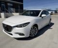 Белый Мазда 3, объемом двигателя 2 л и пробегом 57 тыс. км за 3432 $, фото 1 на Automoto.ua