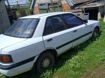 Білий Мазда 3, об'ємом двигуна 1.7 л та пробігом 270 тис. км за 557 $, фото 1 на Automoto.ua