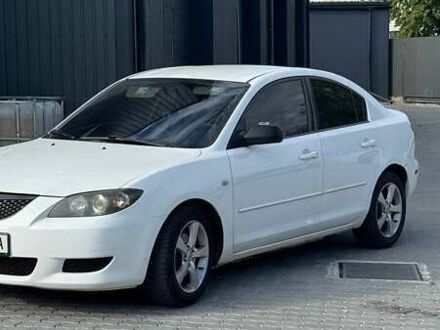 Белый Мазда 3, объемом двигателя 2 л и пробегом 213 тыс. км за 3500 $, фото 1 на Automoto.ua