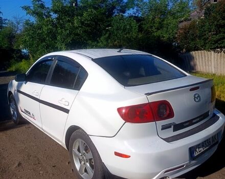 Белый Мазда 3, объемом двигателя 2 л и пробегом 190 тыс. км за 5200 $, фото 1 на Automoto.ua