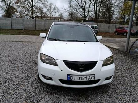 Белый Мазда 3, объемом двигателя 1.6 л и пробегом 235 тыс. км за 5000 $, фото 1 на Automoto.ua