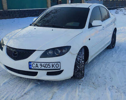 Белый Мазда 3, объемом двигателя 2 л и пробегом 200 тыс. км за 4500 $, фото 1 на Automoto.ua