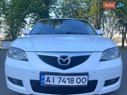 Белый Мазда 3, объемом двигателя 2 л и пробегом 303 тыс. км за 6700 $, фото 1 на Automoto.ua