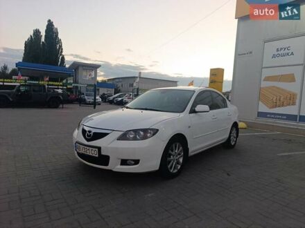Белый Мазда 3, объемом двигателя 2 л и пробегом 285 тыс. км за 5900 $, фото 1 на Automoto.ua