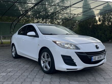 Белый Мазда 3, объемом двигателя 2 л и пробегом 190 тыс. км за 7700 $, фото 1 на Automoto.ua